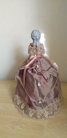 antique half pin doll with skirt