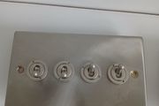 Brushed steel toggle light switches - 3 and 4 gang