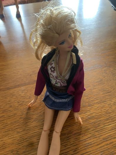 barbie with purple boots and jacket