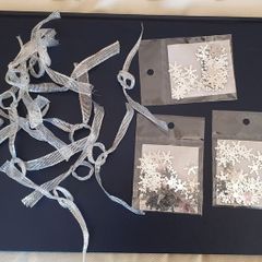 Three Bags of Silver Snow Flakes & 12 Silver Bows