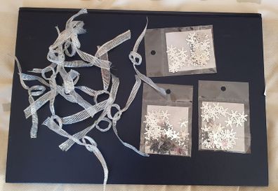 Three Bags of Silver Snow Flakes & 12 Silver Bows
