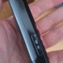 Sony Ericsson W200i , with charger and speakers. Image 8