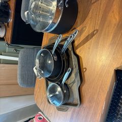 Set of All Clad pots and pans