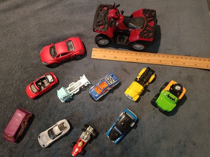 Bundle of assorted die-cast toy cars and quad bike
