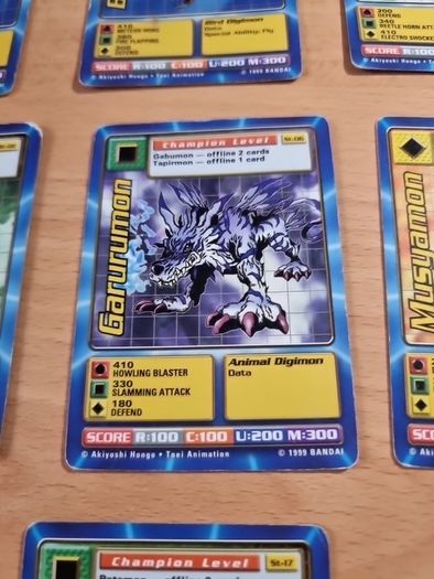 13 Champion level Digimon cards. 1999.