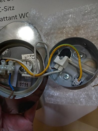 IP44 wall light with one for spares. Swivel angle type. Chrome silver.