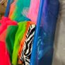Box of assorted colourful tulle and fabric materials Image 4