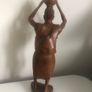wood carving of a woman Image 4
