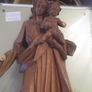 a carved wooden holy figure Image 2