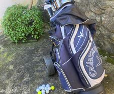 Golf cart - powered. Clubs, bag, balls etc