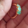 A trilogy ring for women with emeralds and 925 sterling silver in gold plated,TJC.. Image 5