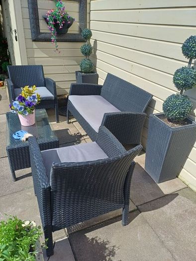 Garden Rattan set. 2 Seater Sofa, 2 Armchairs, 2 Planters, Coffee Table.table