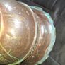 Antique Copper Jardiniere Planter, likely dating from around 1880s to 1920s. It features a distinctive scalloped, or frilled, edge rim. The body is adorned with embossed floral and swag designs. Image 5
