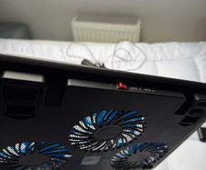 two stands for a laptop with a fan