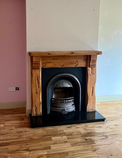 Cast Iron and timber fireplace
