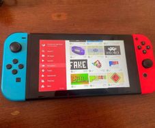 Nintendo Switch V2 (Modded / Chip) + Dock + 256GB + Case