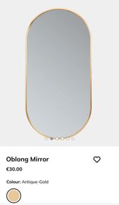 Rose gold oval mirror