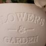 Faux Flowers In Ceramic Pot Image 4