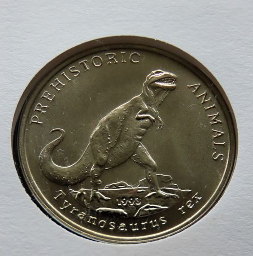 T-Rex Dinosaur collectors coin in vintage stamp cover