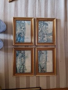 Four gold frames with horses hunting prints
