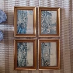Four gold frames with horses hunting prints