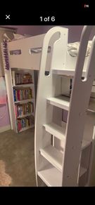 Loft bed with dressing table, drawers, wardrobe, bookshelf and bed