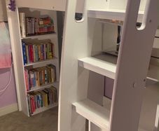 Loft bed with dressing table, drawers, wardrobe, bookshelf and bed