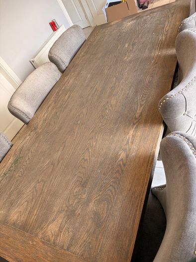 Solid wood table with dining chairs
