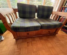 Sofa with wooden drawers