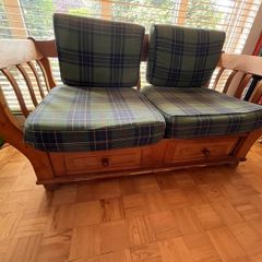 Sofa with wooden drawers