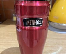 Thermos travel mug