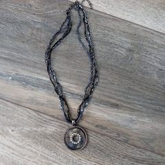 Charm and Beaded Necklace.