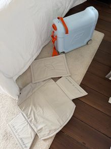 Stokke Jet Kids ride on suitcase/plane bed