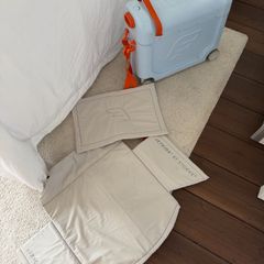 Stokke Jet Kids ride on suitcase/plane bed