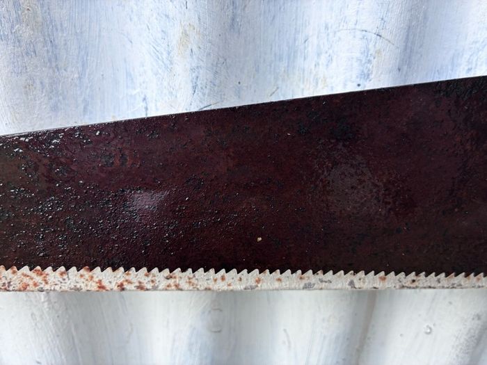 vintage wooden handled carpenters saw