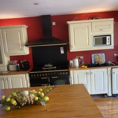Kitchen + Island + Solid Oak Countertops + Integrated Dishwasher + black sink & gold mixer tap