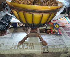 Large Heavy Wrought Iron Hand Blown Glass Fruit Bowl resembles Art Nouveau styles with a yellow and blue ombre finish,