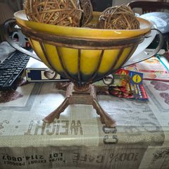 Large Heavy Wrought Iron Hand Blown Glass Fruit Bowl resembles Art Nouveau styles with a yellow and blue ombre finish,