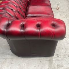 A fantastic blood red chesterfield 3+1+1 suite