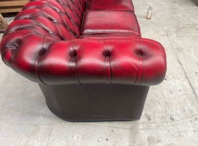 A fantastic blood red chesterfield 3+1+1 suite