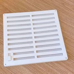 White plastic wall vent cover, adjustable ventilation grille with fly screen and slider shutter, room air vent panel