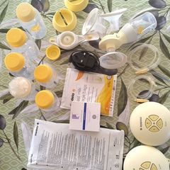 Madela single pump + bottles + nipples and extra bits