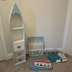 Shelving, duvets, curtains for a blue coastal themed bedroom