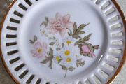 Australian hanging small bone china plate.  Signed Mildly Dent ceramics hinging plate 1985
