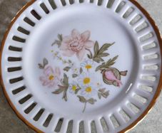 Australian hanging small bone china plate.  Signed Mildly Dent ceramics hinging plate 1985