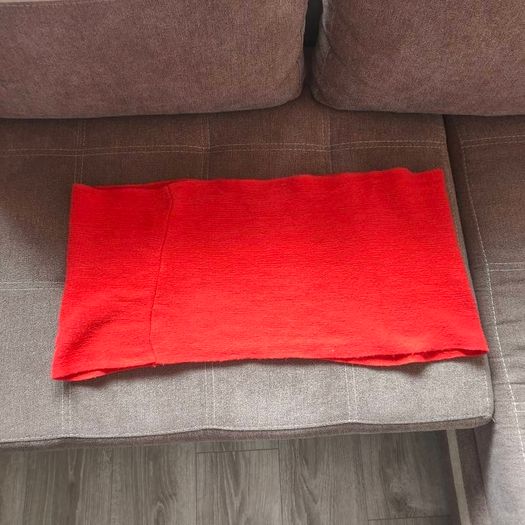 Orange knitted loop scarf