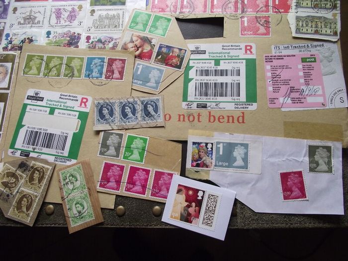 A box with collection of stamps from Great Britain