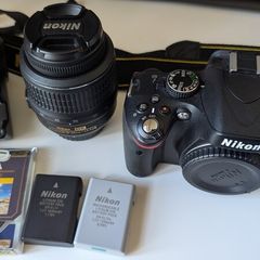 Nikon D5100 with lens, batteries, charger, bag