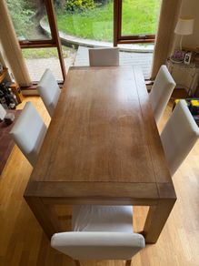 wooden table and 6 chairs