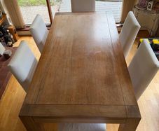 wooden table and 6 chairs
